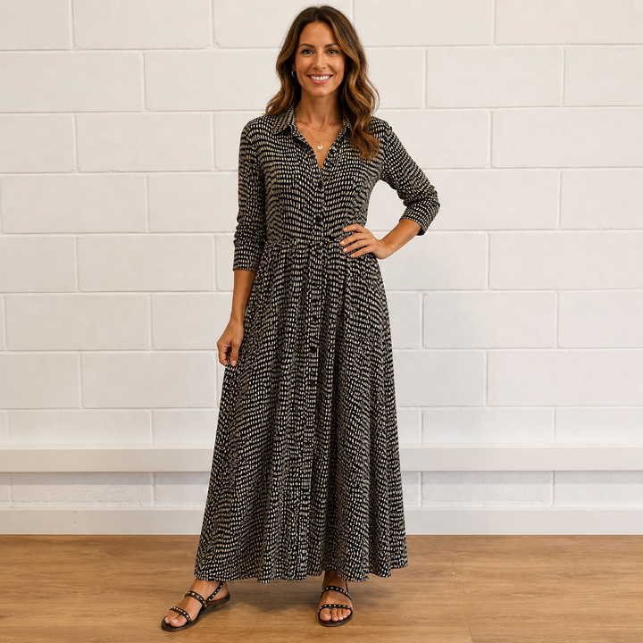 Women's elegant printed button-front maxi dress. Long sleeve flowy design, perfect for casual chic or day-to-night wear.