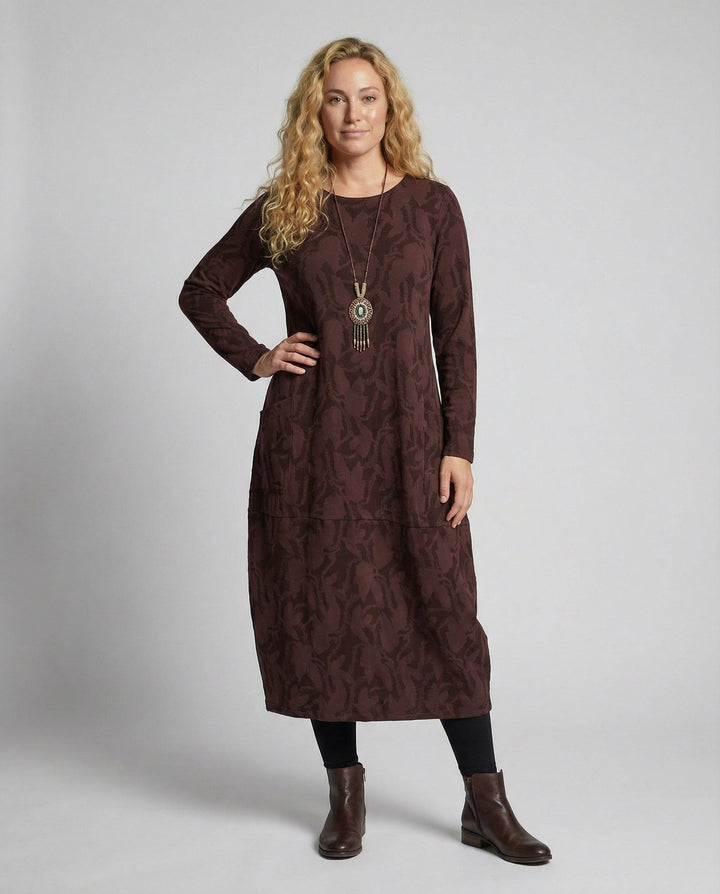 Women's elegant printed long-sleeve midi dress, perfect for fall and winter fashion. Chic and versatile.