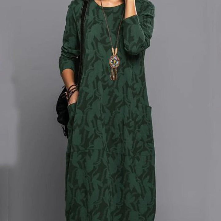 Chic women's printed long-sleeve midi dress with pockets, ideal for sophisticated casual or elegant wear.