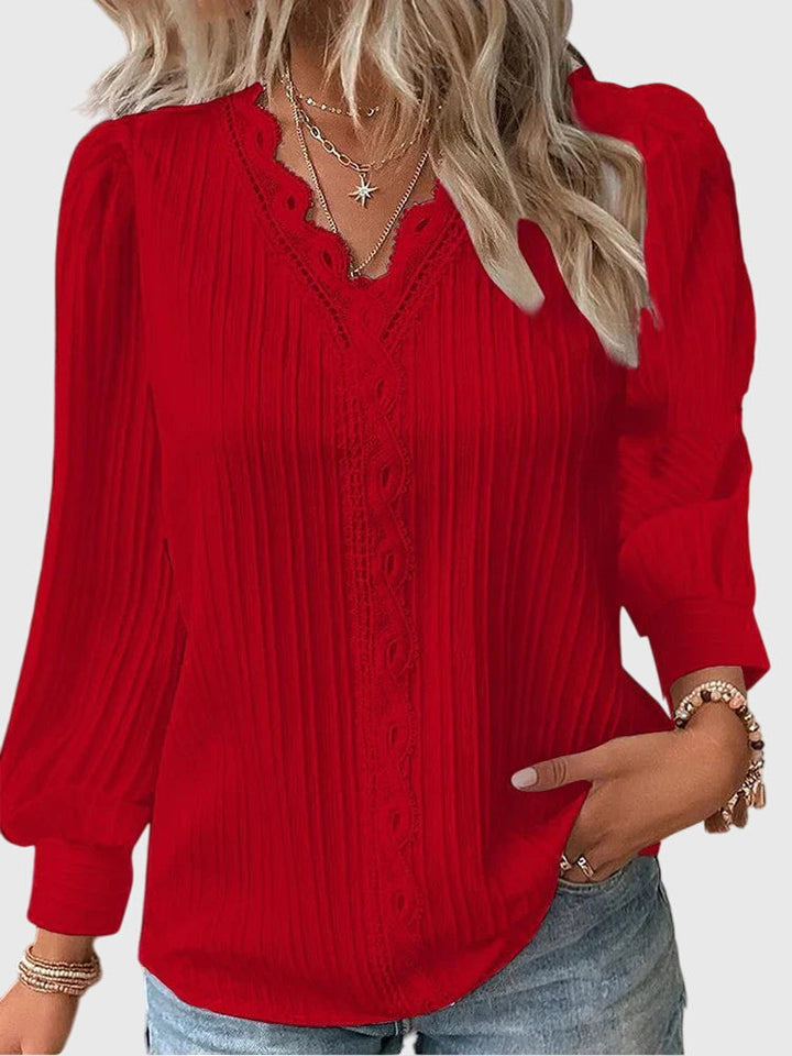 Sophisticated women's elegant pullover blouse. Comfortable long sleeve top for everyday elegance and stylish comfort.