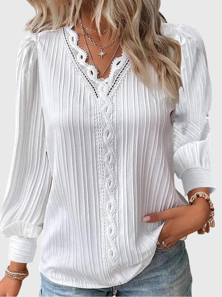 Elegant women's pullover blouse. A versatile & chic long sleeve top for a polished look, from office to evening.
