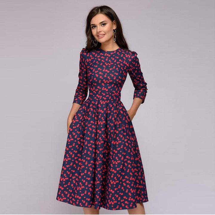 Floral print elegant midi dress for women, with 3/4 puffed sleeves. A stylish A-line retro party dress.