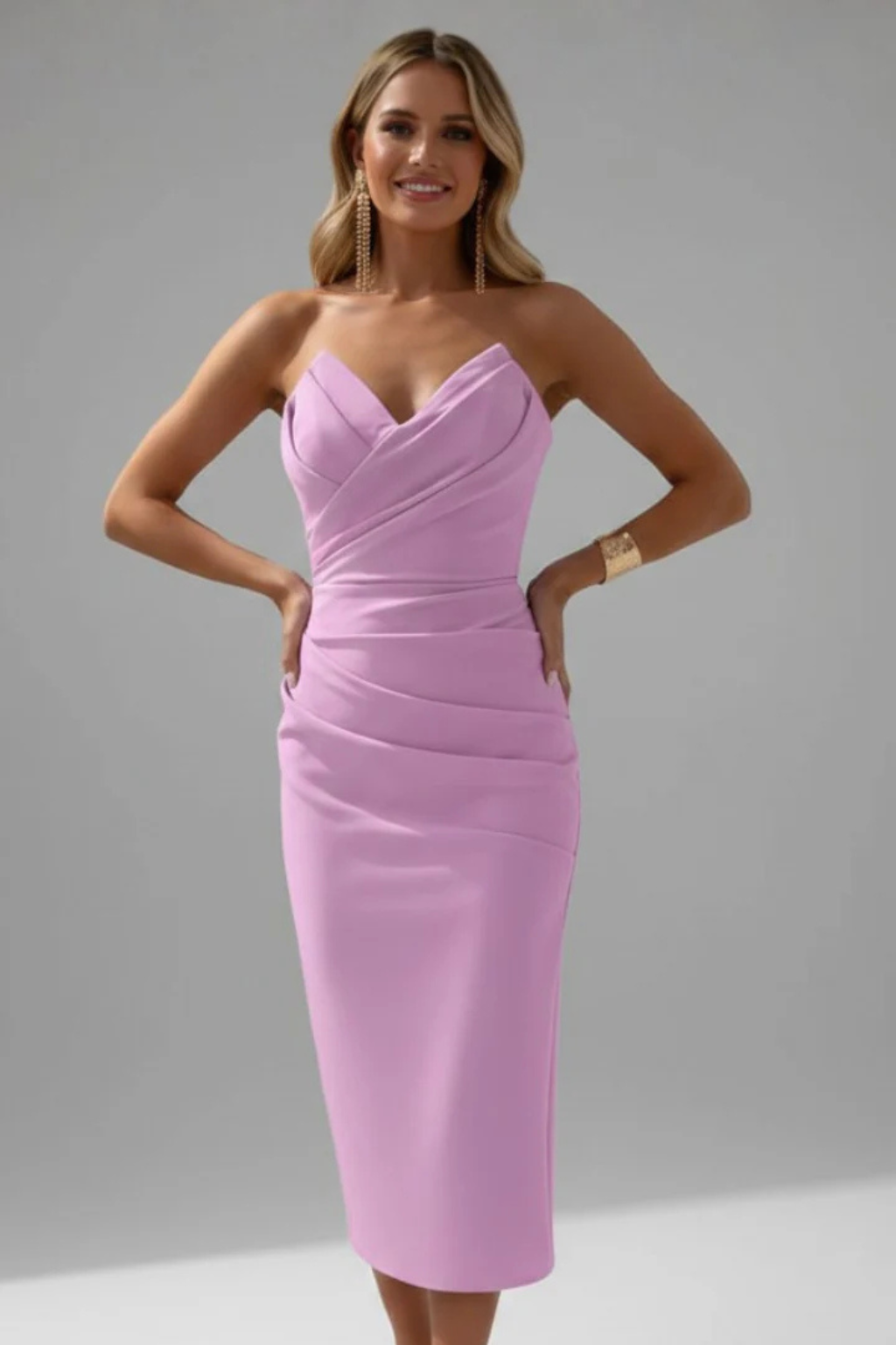 Figure-flattering women's ruched midi dress, sweetheart neckline, elegant fitted silhouette.