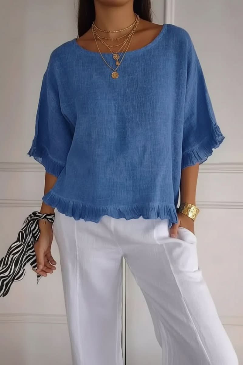 Women's elegant ruffle blouse, perfect for office wear or a chic casual look. Versatile summer top.