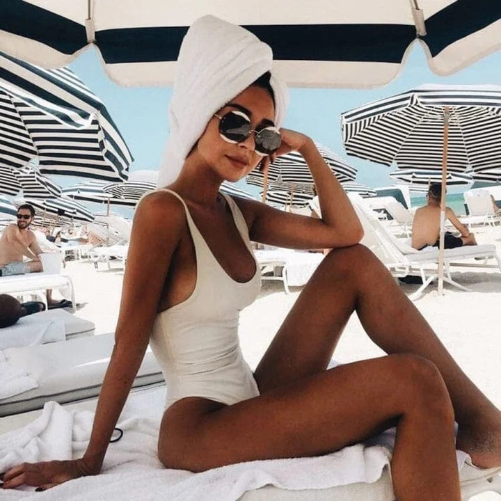 Elegant women's scoop neck one piece swimsuit, perfect for vacation, poolside fashion & summer style.