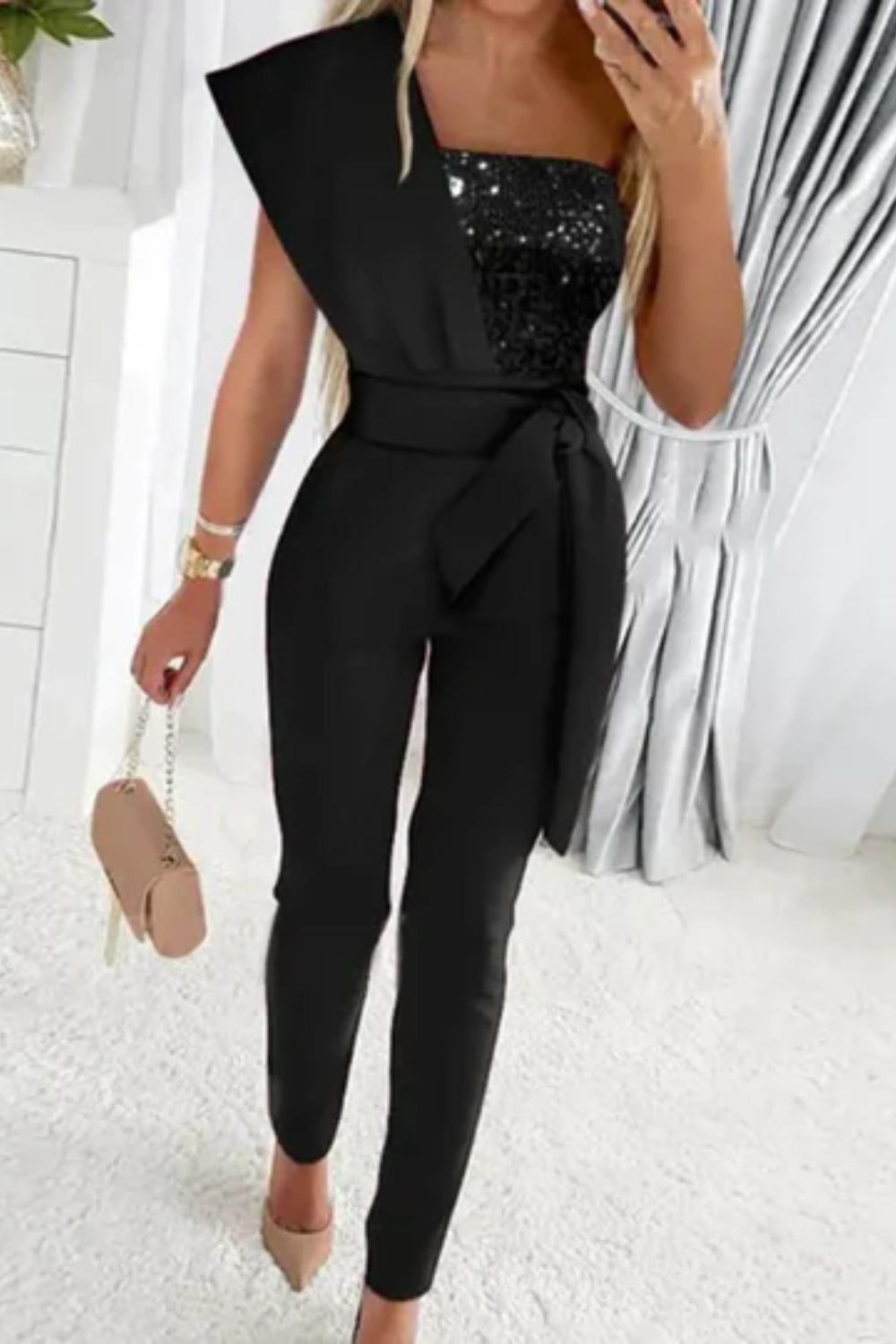 Elegant women's sequin jumpsuit, sophisticated evening wear for glamorous special occasions.