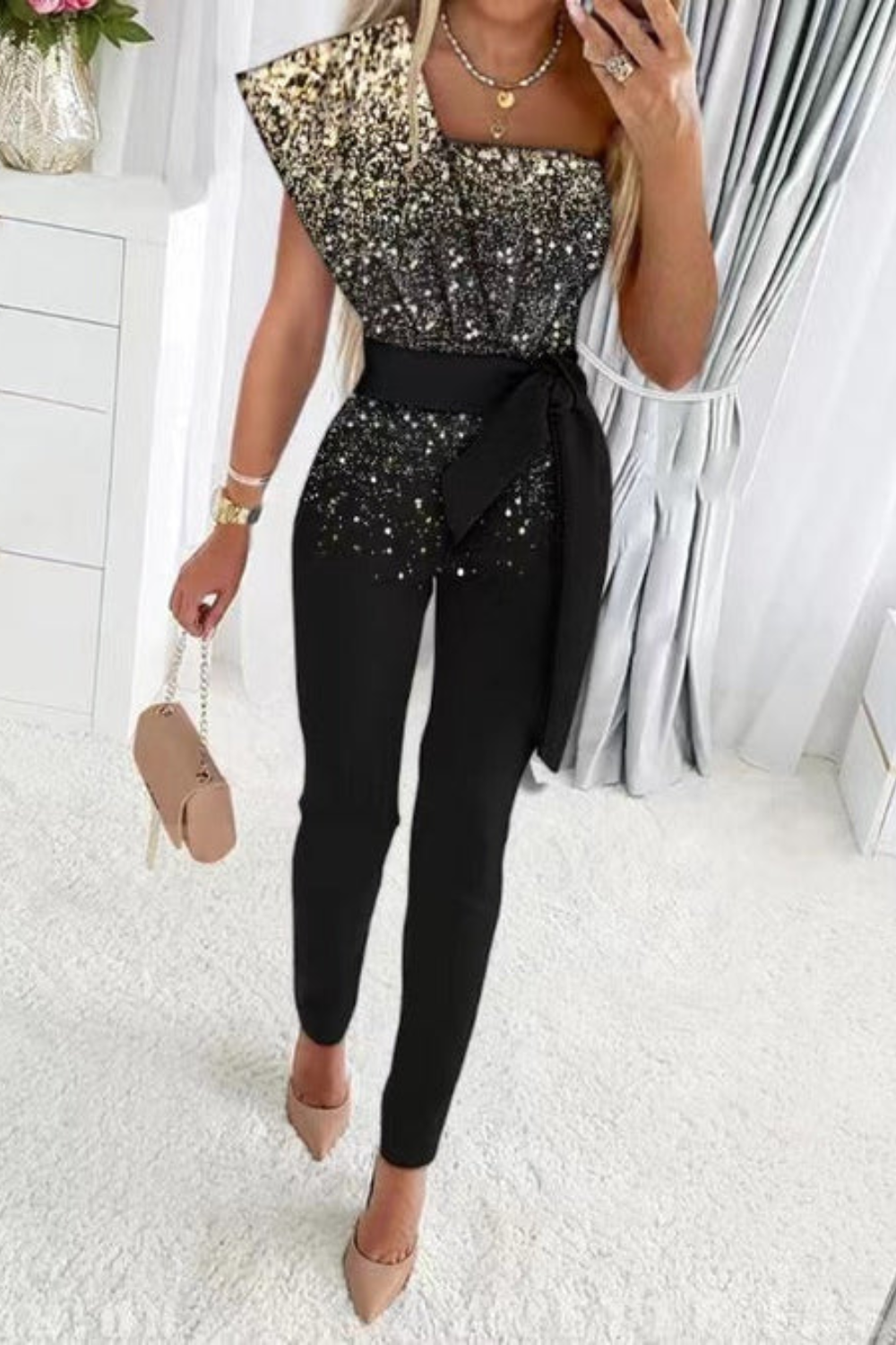 Formal sequin jumpsuit for women, a sparkling and glamorous choice for cocktail parties & evening events.