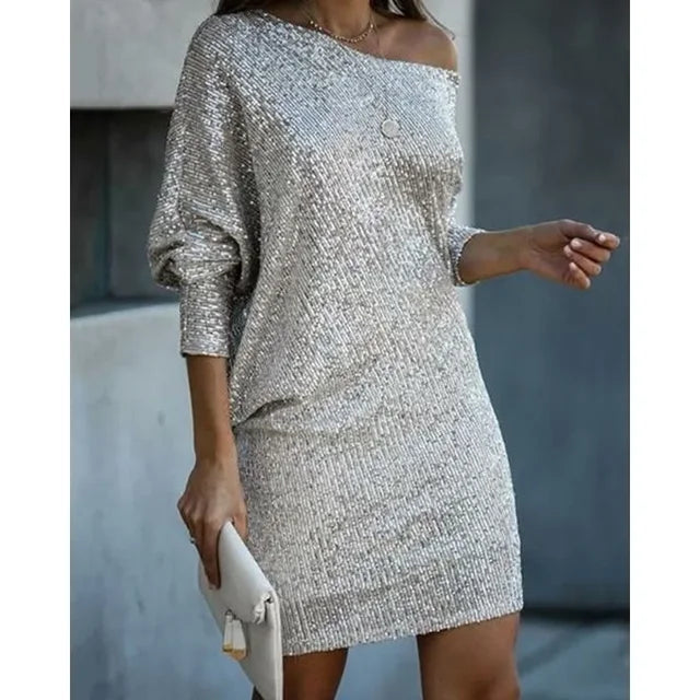 Short women's sequin evening dress, a glamorous party mini for dazzling nights.