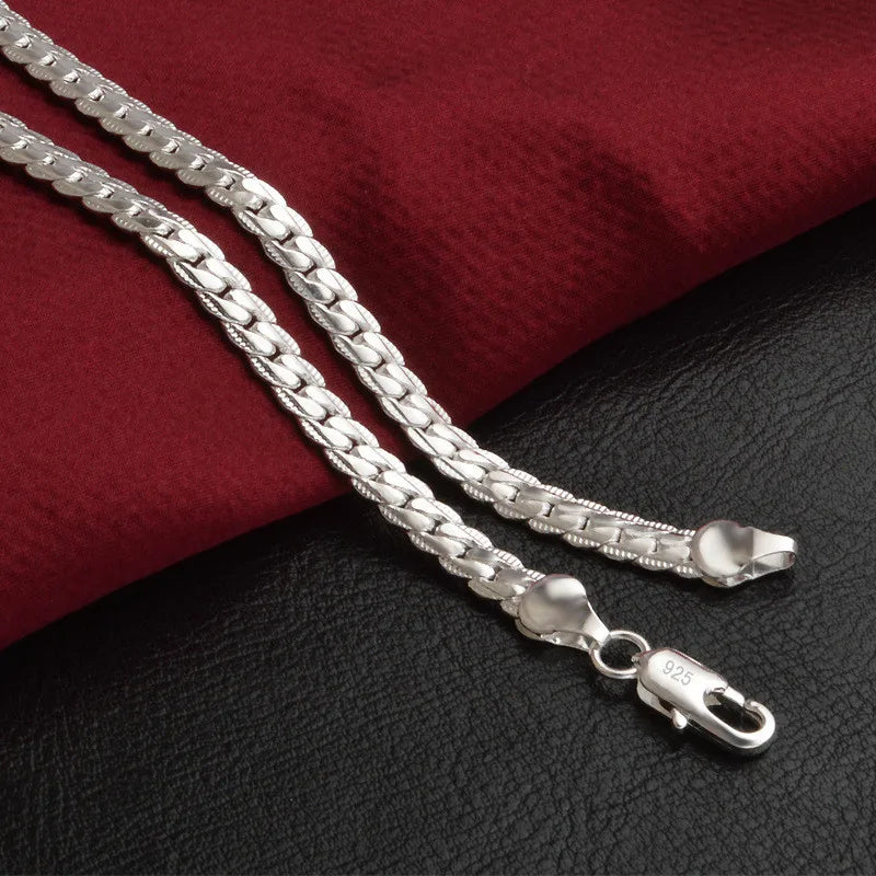 Minimalist silver pendant necklace for women. A delicate, timeless accessory and lucky charm for elegant style.