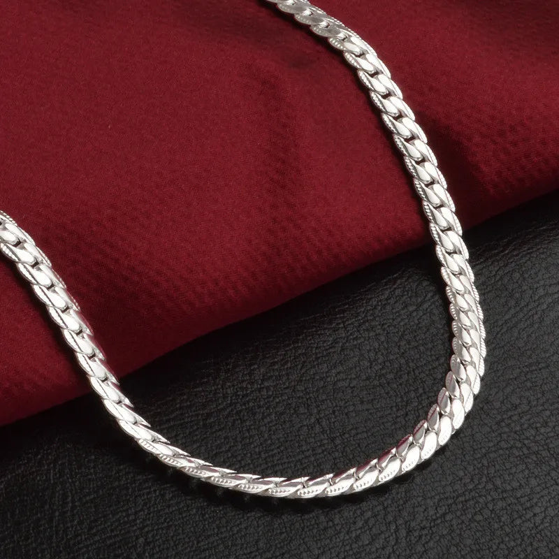 Shimmering silver lucky necklace for women. Elegant and delicate, this fashion jewelry piece adds subtle charm.