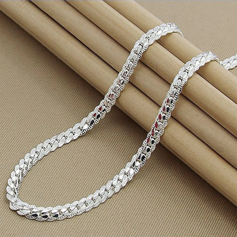 Stylish women's silver lucky pendant necklace, embodying minimalist elegance. A timeless accessory and perfect gift.