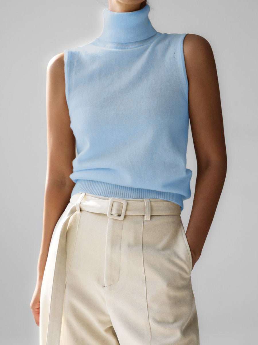 Fashionable women's sleeveless mock neck knit top, showcasing its elegant style for various occasions.