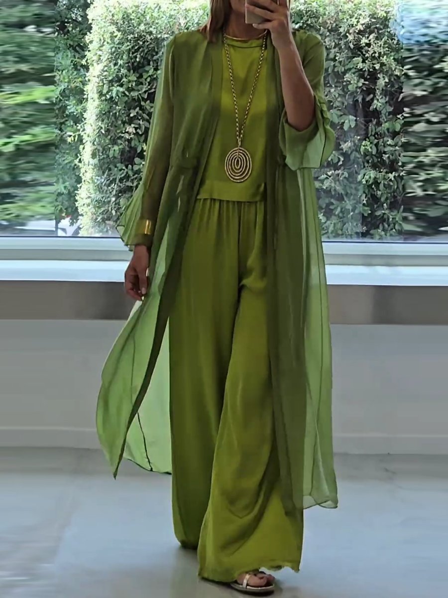Versatile women's three-piece fashion set. Elegant and comfortable polyester outfit for lounge or stylish casual wear.