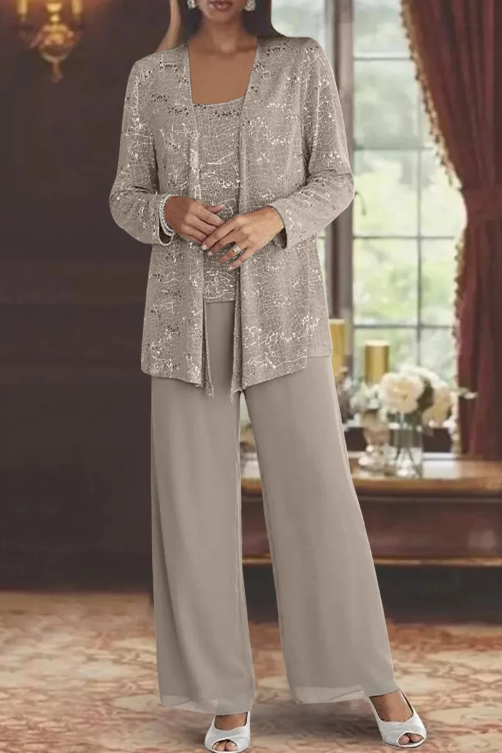 Model posing in the flowy women's three-piece formal set, perfect for any special occasion.