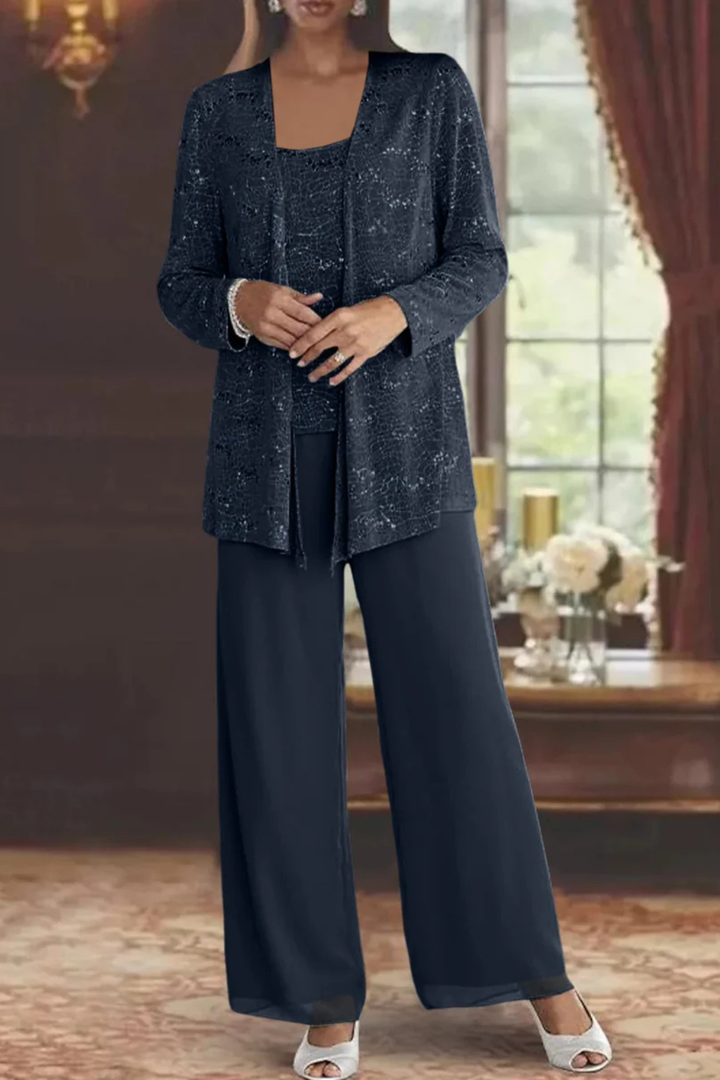 Detail of the elegant fabric & drape of the women's formal 3-piece evening set.
