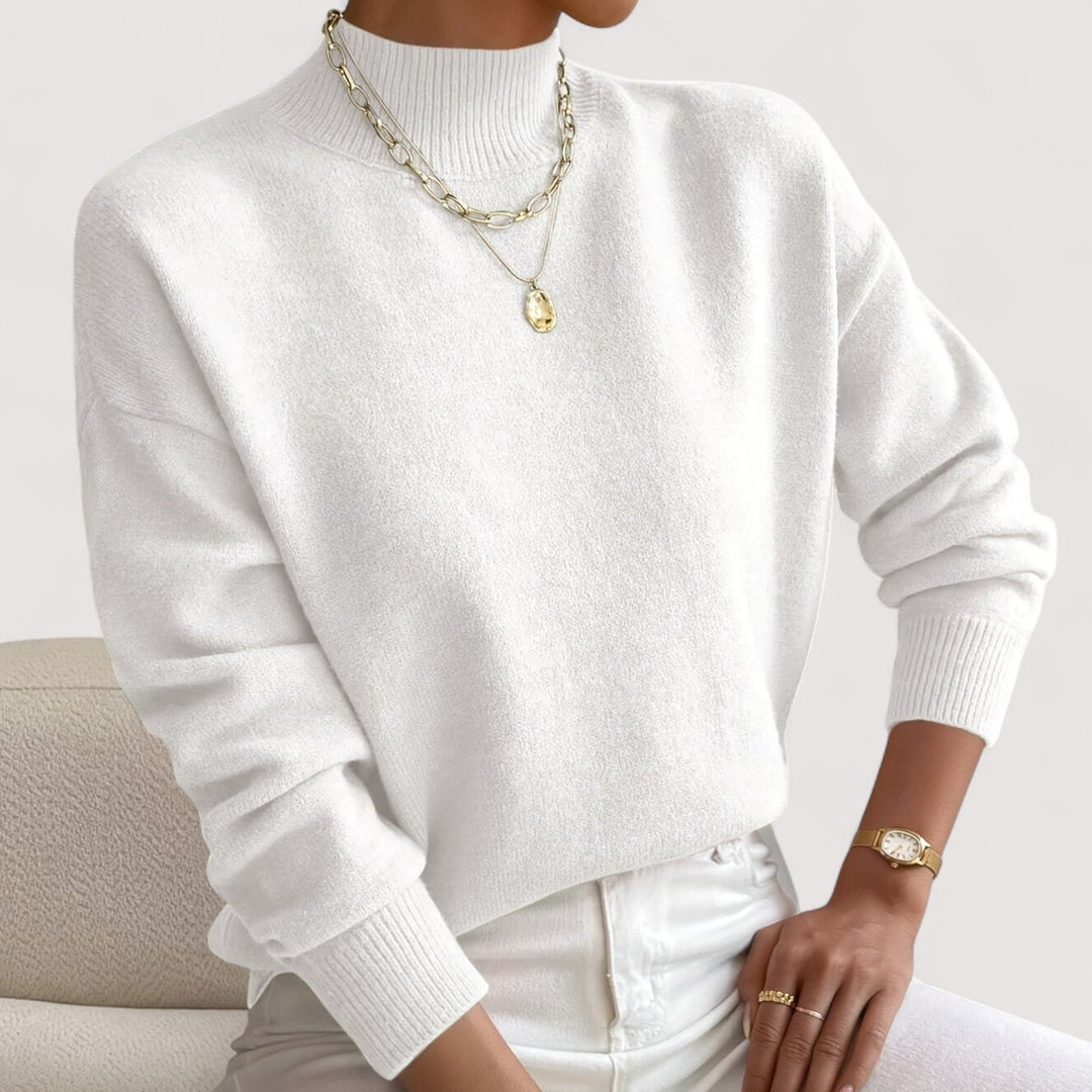 Women's elegant turtleneck sweater, perfect for cozy winter fashion. Chic long sleeve knitwear pullover.