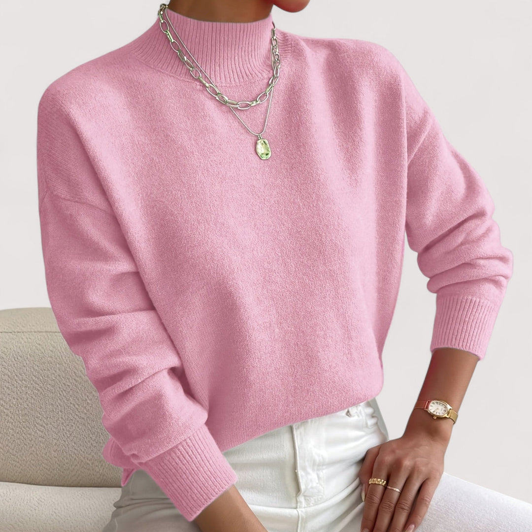 Cozy women's knit turtleneck sweater for winter warmth. Versatile and chic long-sleeve pullover.
