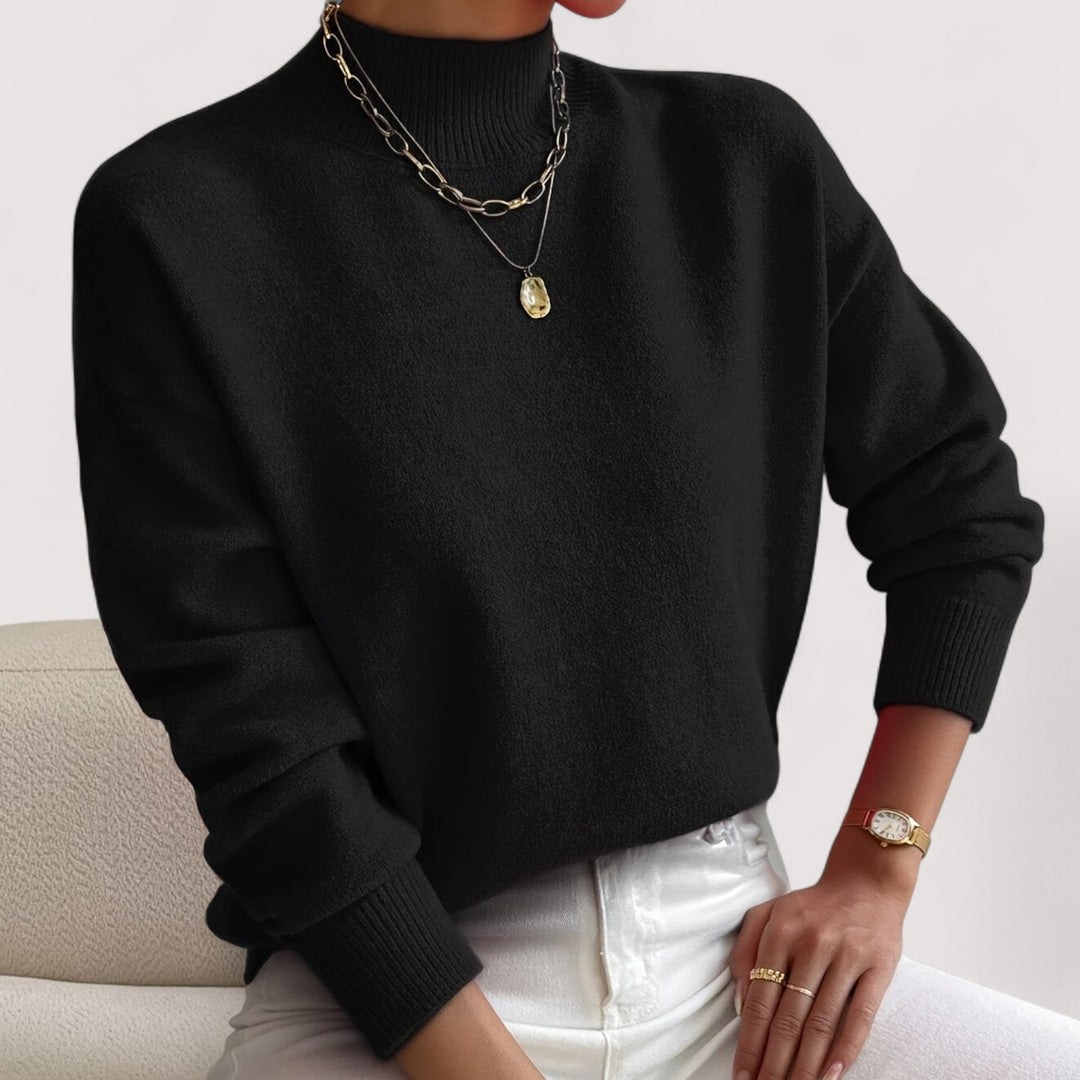 Versatile women's cozy turtleneck knit sweater. Elegant long-sleeve pullover for winter outfits.
