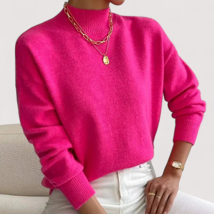 Chic women's winter turtleneck sweater. Elegant and warm long-sleeve knitwear for any occasion.