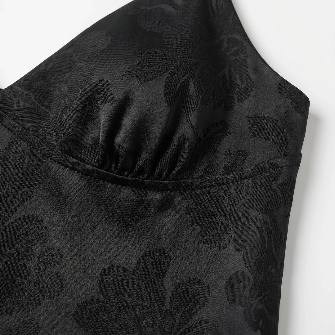Comfortable women's cropped V-neck cami featuring beautiful floral jacquard fabric and thin spaghetti straps.