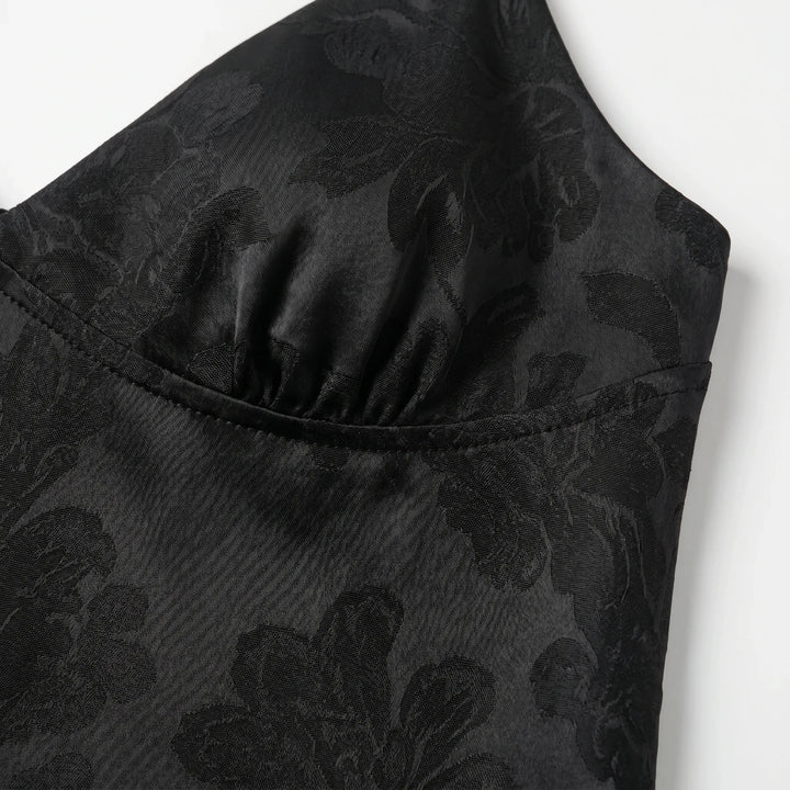 Comfortable women's cropped V-neck cami featuring beautiful floral jacquard fabric and thin spaghetti straps.