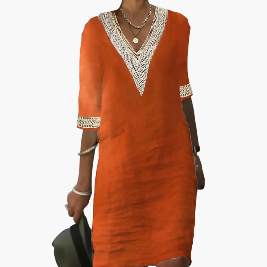 Chic women's V-neck shift midi dress with a relaxed fit. Ideal for casual outings, vacations, or daily comfort.