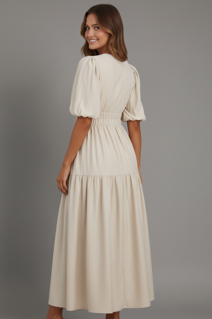 Elegant women's fashion V-neck midi dress, showcasing a beautiful tiered layered hem. Great for summer parties.