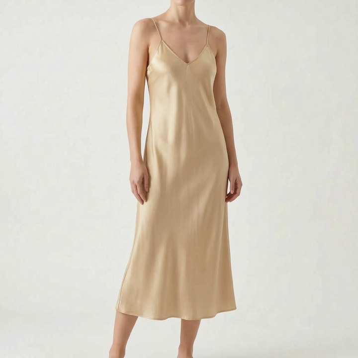 Chic women's V-neck slip midi dress. An elegant summer party dress with a flattering silhouette.