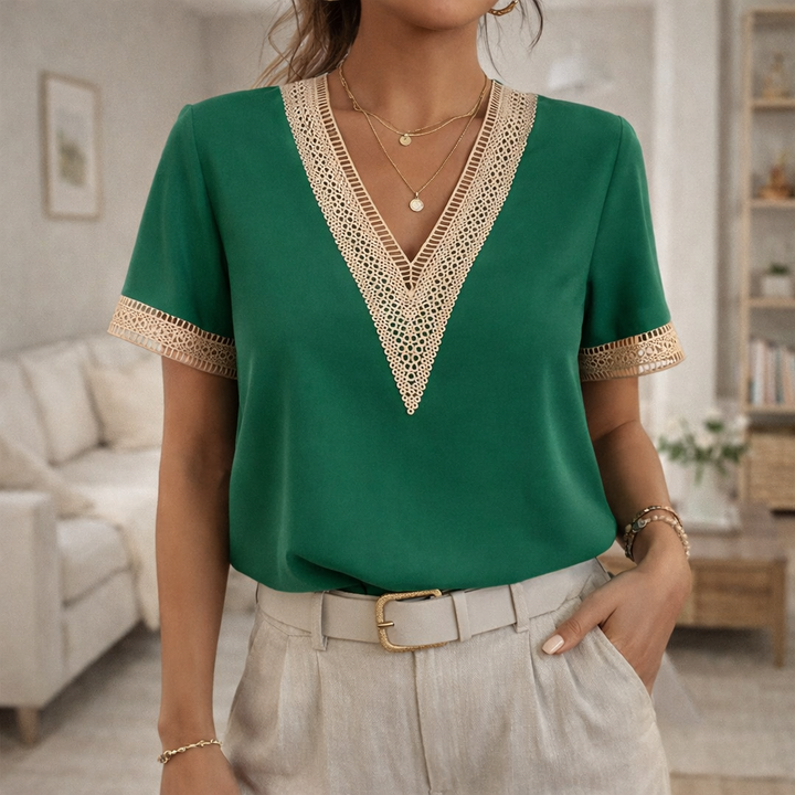 Elegant short-sleeve V-neck top for women, featuring lace trim, suitable for spring and summer fashion.