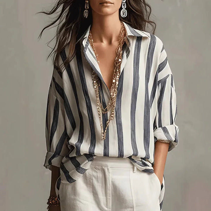 Women's elegant vertical stripe blouse with open collar. Relaxed fit, long sleeve, perfect for office or casual chic.
