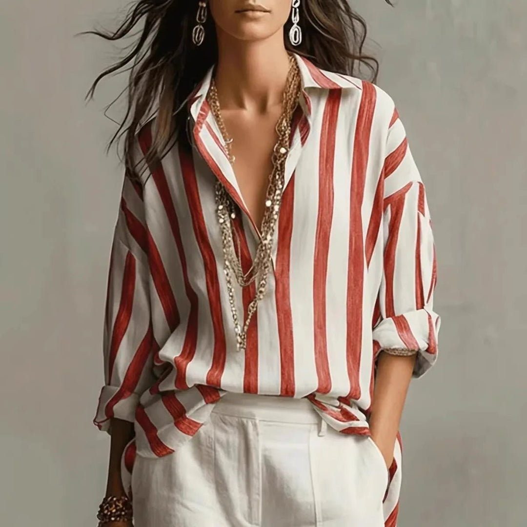 Fashionable women's vertical stripe top, featuring an elegant open collar and long sleeves. Ideal for work or leisure.