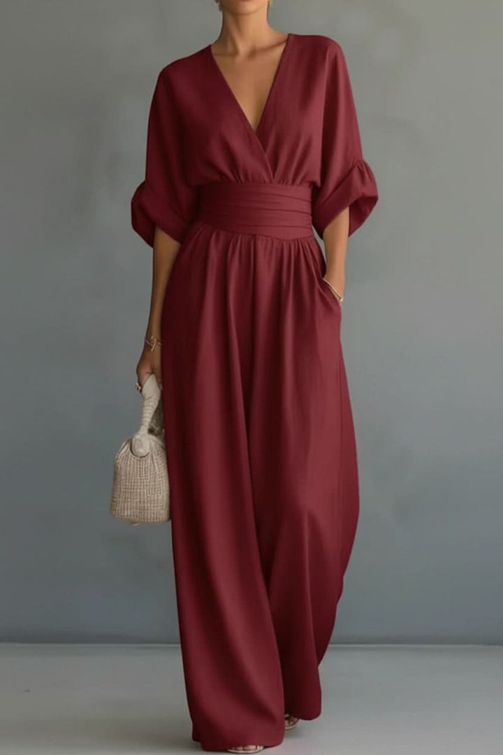 Women's vintage style jumpsuit, elegant one-piece for versatile casual & evening wear comfort.