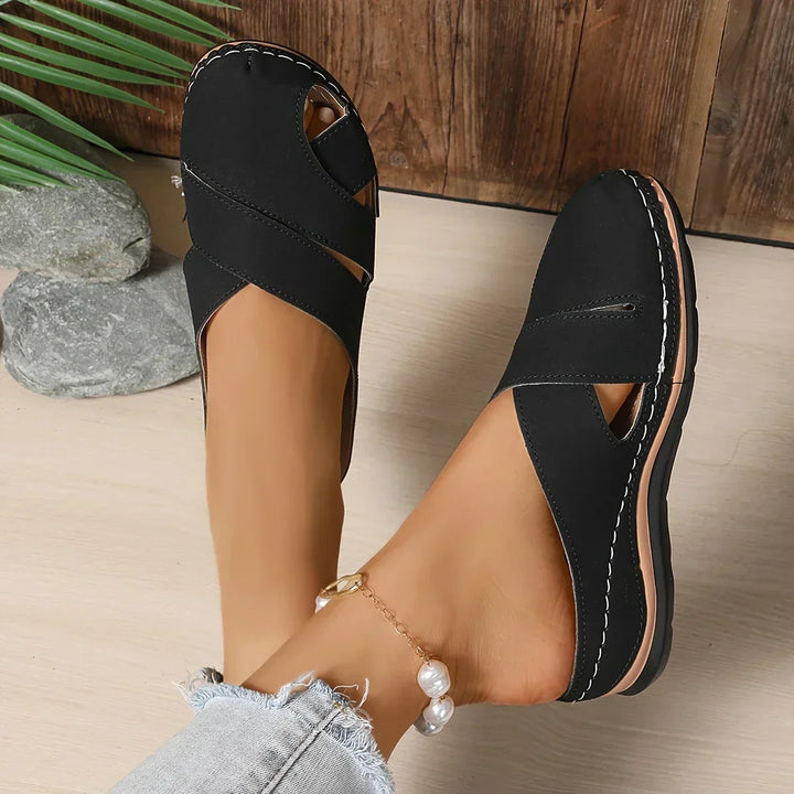 Comfortable women's blue platform wedge sandals, offering elevated style and chic design for summer outfits.