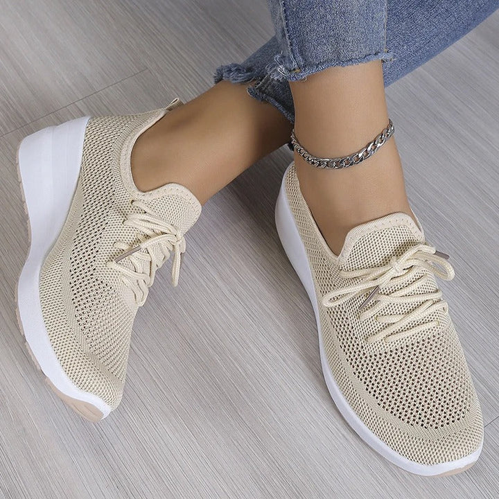 Comfortable women's wedge platform sneakers, offering elevated style & support for spring & summer fashion.