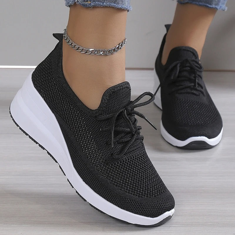 Chic black women's elevated platform wedge sneakers, versatile for casual outfits & summer/spring fashion.