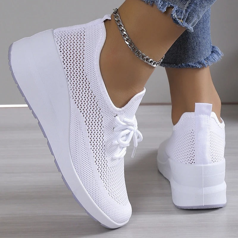 Fashion women's platform wedge sneakers, designed for comfortable walking & elevating everyday casual style.
