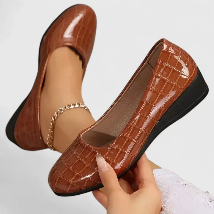 Chic women's square toe loafers. Embossed detail, comfortable wedge heel. Versatile elegant footwear for any occasion.