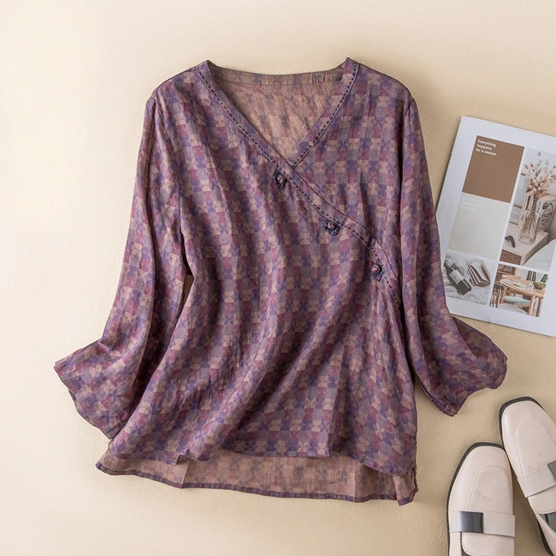 Embroidered button front women's blouse, relaxed fit, long sleeves, a stylish and comfortable everyday top.