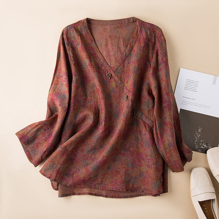 Light & airy women's embroidered button front blouse, relaxed long sleeves, perfect spring/summer casual wear.