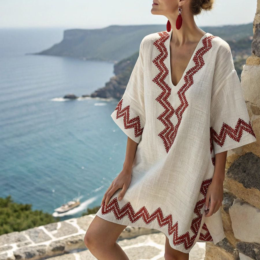 Women's embroidered kimono tunic dress for beach holidays, featuring a loose fit and V-neck. Ideal resort wear.
