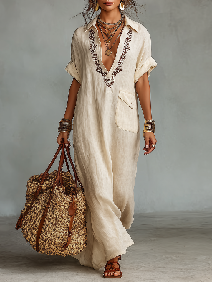 Women's embroidered short sleeve maxi dress in a loose fit, perfect for casual summer fashion or vacation wear.