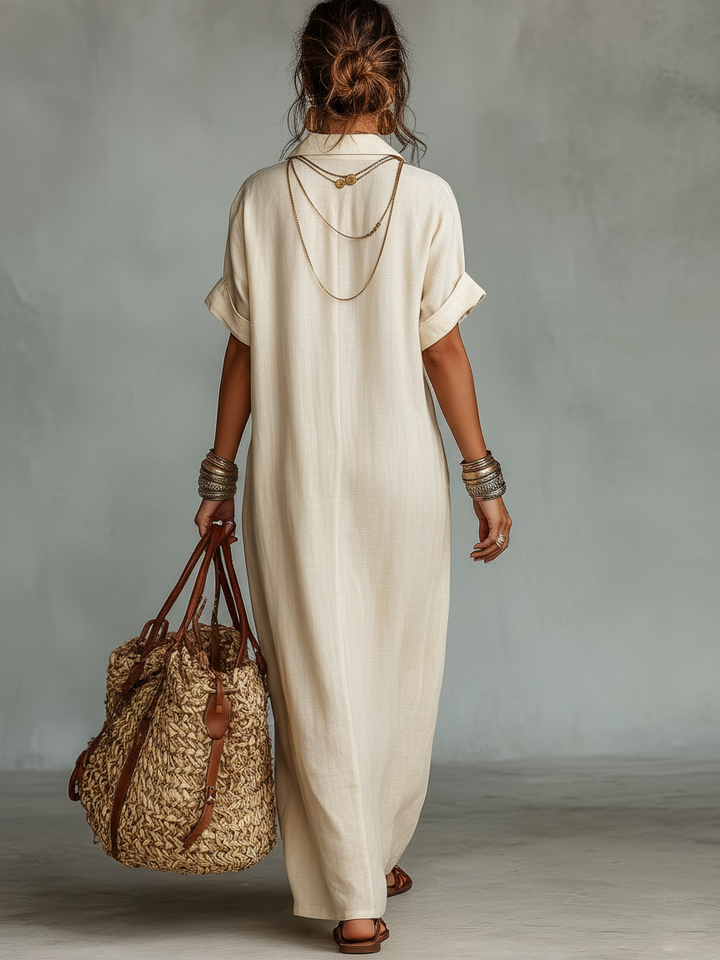 Elegant beige women's embroidered maxi dress with short sleeves, ideal for spring style and day wear.