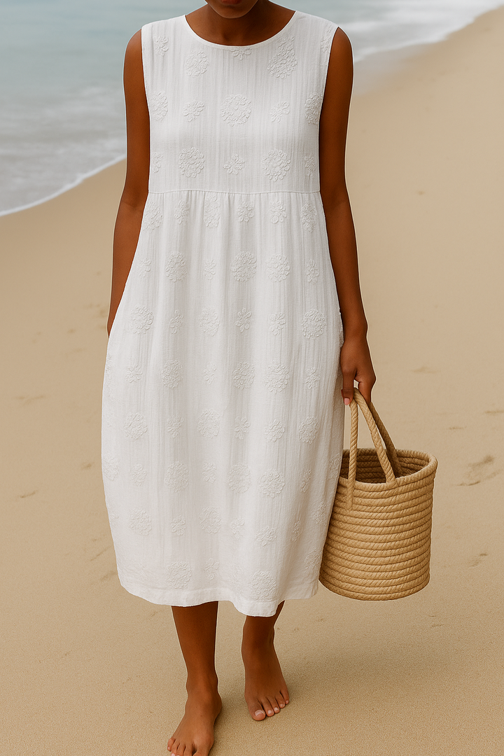 Comfortable women's flowy midi dress with elegant embroidery. A versatile sleeveless dress for spring or summer everyday wear.