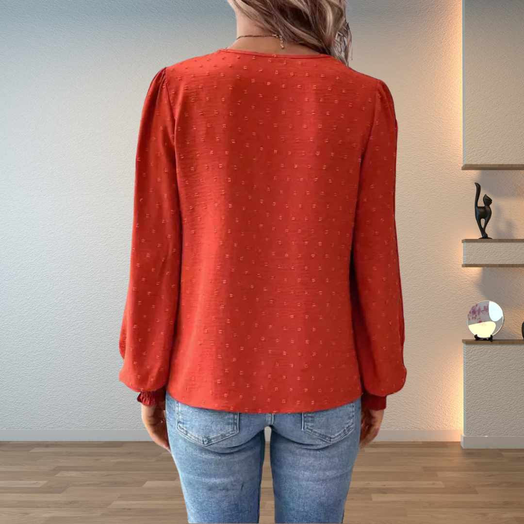 Red women's embroidered V-neck blouse with puff sleeves, a stylish and versatile long sleeve top.