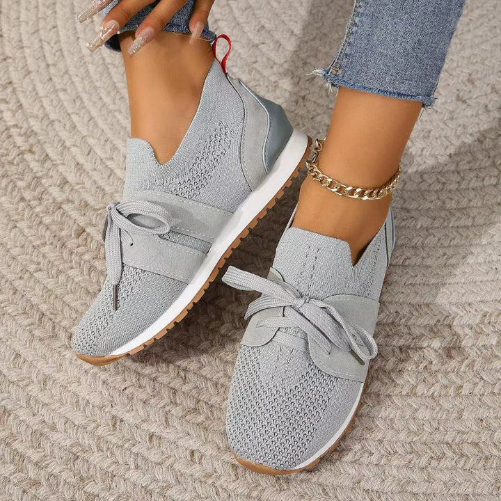 Stylish women's orthopedic sneakers, designed for active comfort and ergonomic support, perfect everyday footwear.