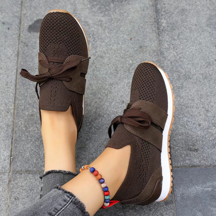 Comfortable women's orthopedic sneakers offering ergonomic support for pain relief, suitable for daily walking & activity.