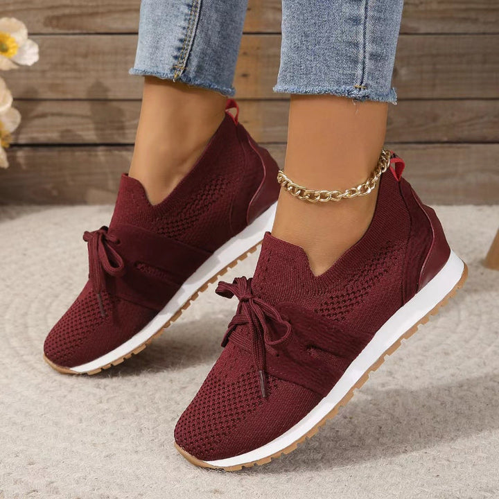 Supportive women's orthopedic sneakers, engineered for comfort, promoting foot health and pain-free active wear.
