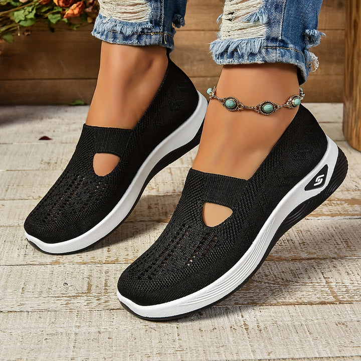 Women's comfortable slip-on sneakers, ergonomic design & lightweight for daily walking.