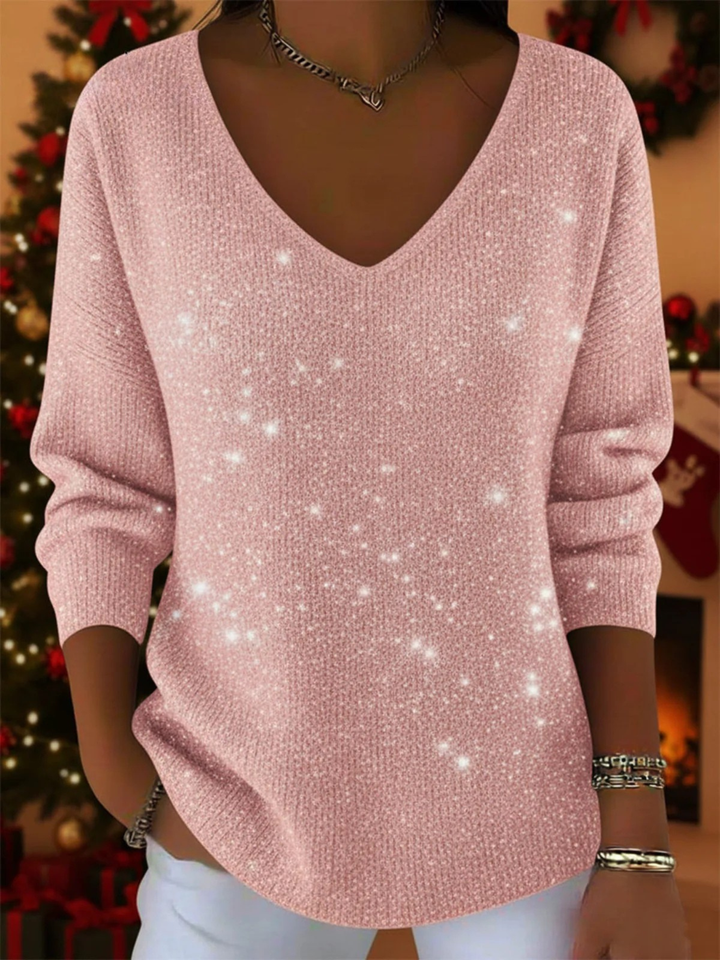 Cozy fall outfit: women's festive v-neck sweater. Warm long-sleeve top, perfect for elegant casual style.