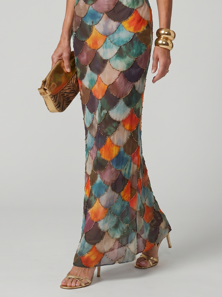 Elegant sleeveless halter maxi dress for women, showcasing a bold geometric print. Perfect for evening or summer.